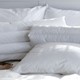 Should I Sleep With a Pillow Between My Legs? Understanding the Health Benefits