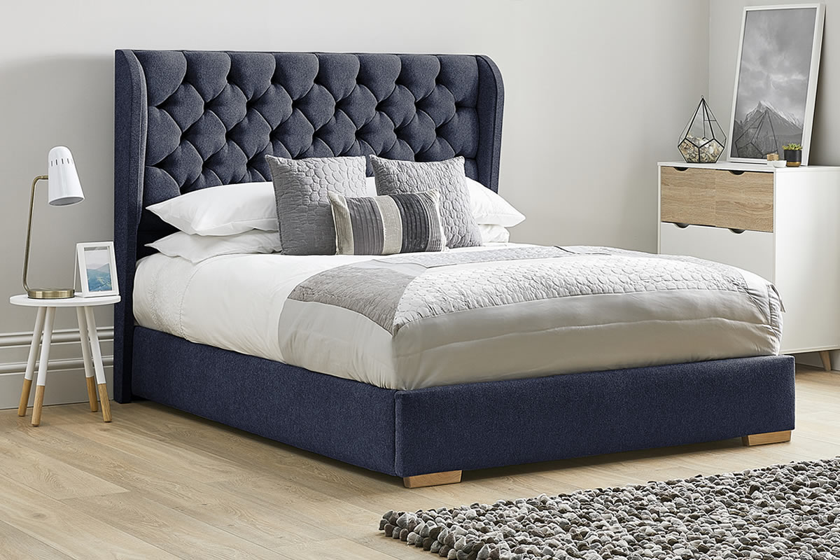 View Blue Fabric Bed Frame Tall Deeply Padded Buttoned Winged Headboard Heavy Duty 46 Double Bed Low Foot End Aster information
