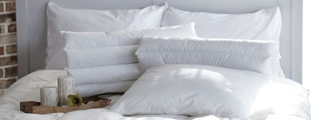 Should I Sleep With a Pillow Between My Legs? Understanding the Health Benefits