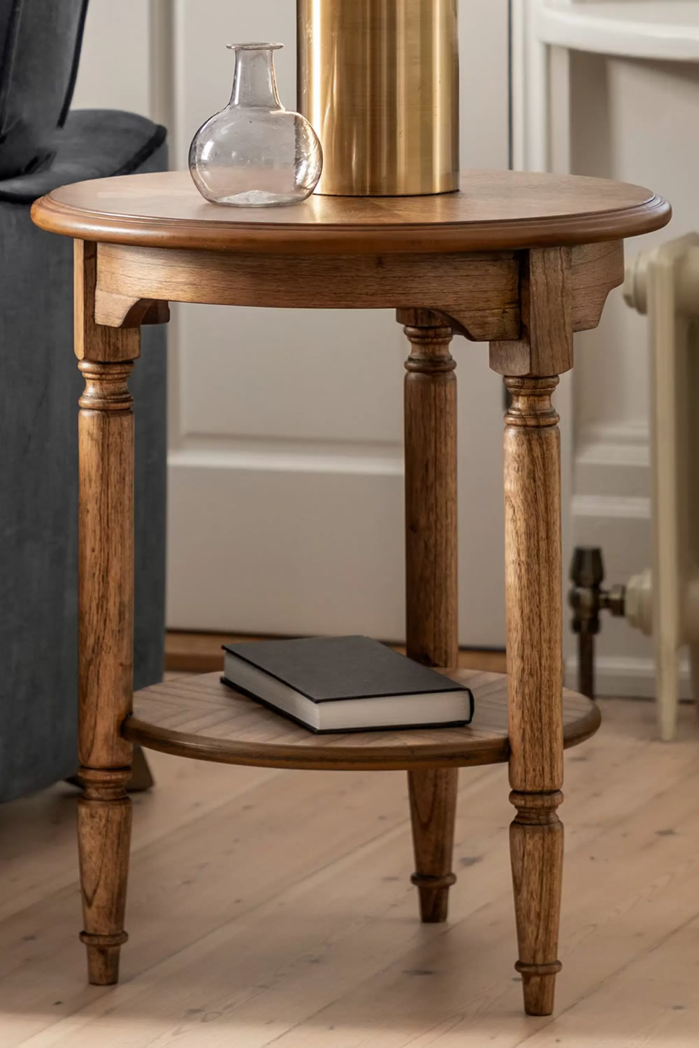 View Highgrove Round Antique Brown Wooded 2Tier Side Table Crafted From Mindi Wood With Marquetry Inlaid Details Space Saving Design information