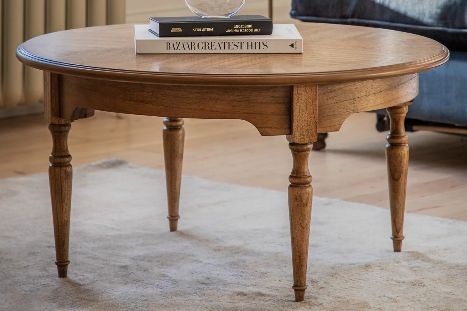 View Highgrove Round Wooden Coffee Table Crafted From Mindi Wood With Intricate Marquetry Detail SpindleTurned Legs Ideal For Living Room Spaces information