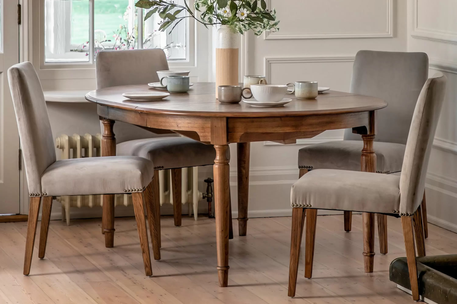 View Highgrove Small Round Extending Dining Table Crafted From Mindi Wood With Intricate Marquetry Detail SpindleTurned Legs Seats 46 People information