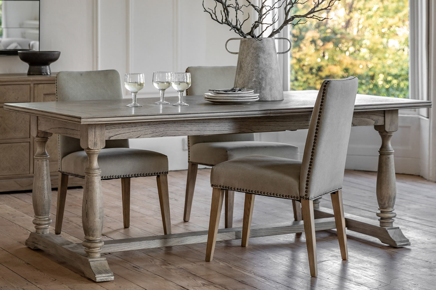 View Mustique Rectangle Extending Wooden Dining Table Crafted From Mindi Ash MDF Spacious Tabletop Robust Spindle Turned Legs Seats 810 People information