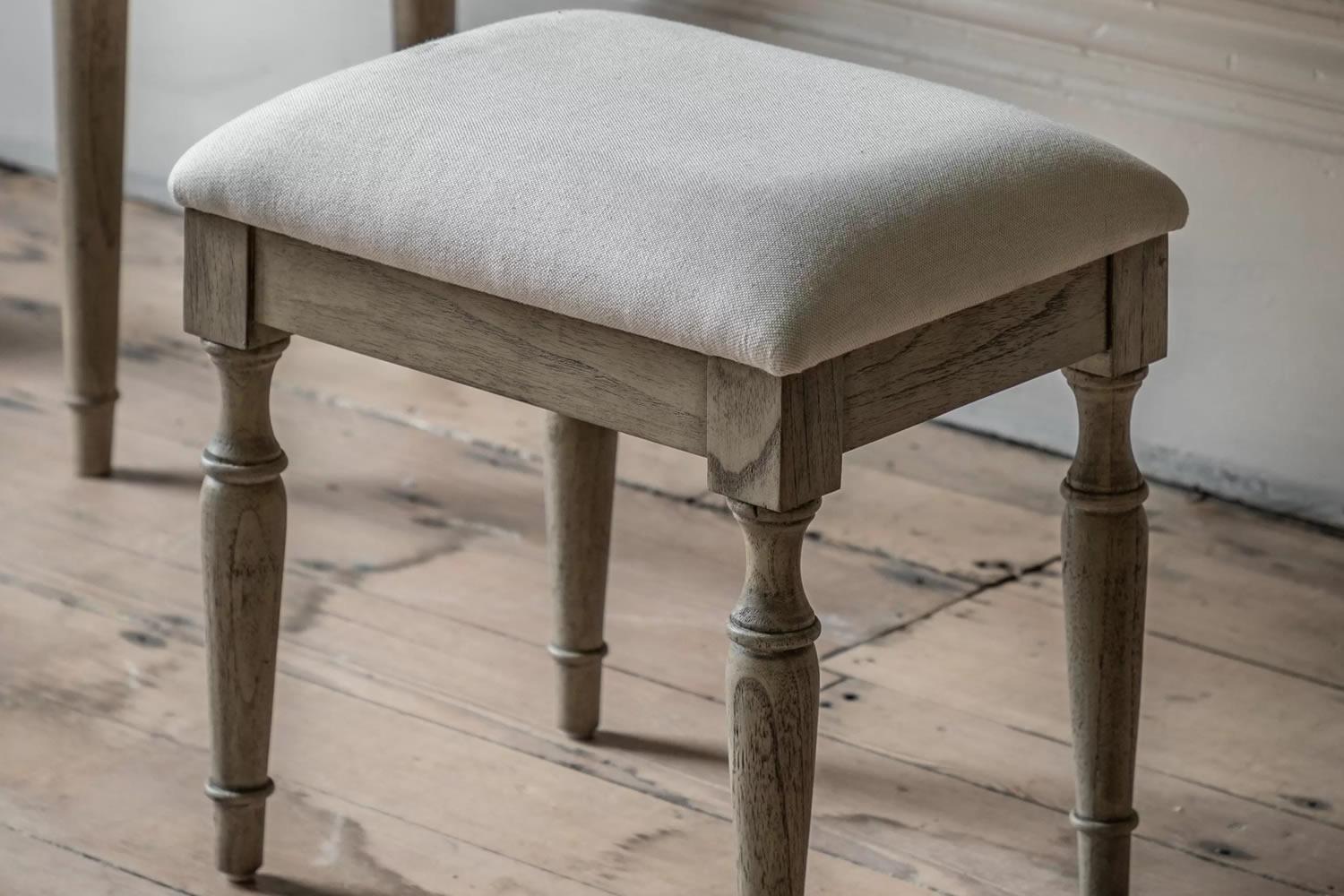 View Mustique Dressing Stool Crafted From Mindi Ash MDF Deeply Padded Seat Cushion Linen Upholstered Seat In Natural Finish Spindle Turned Legs information