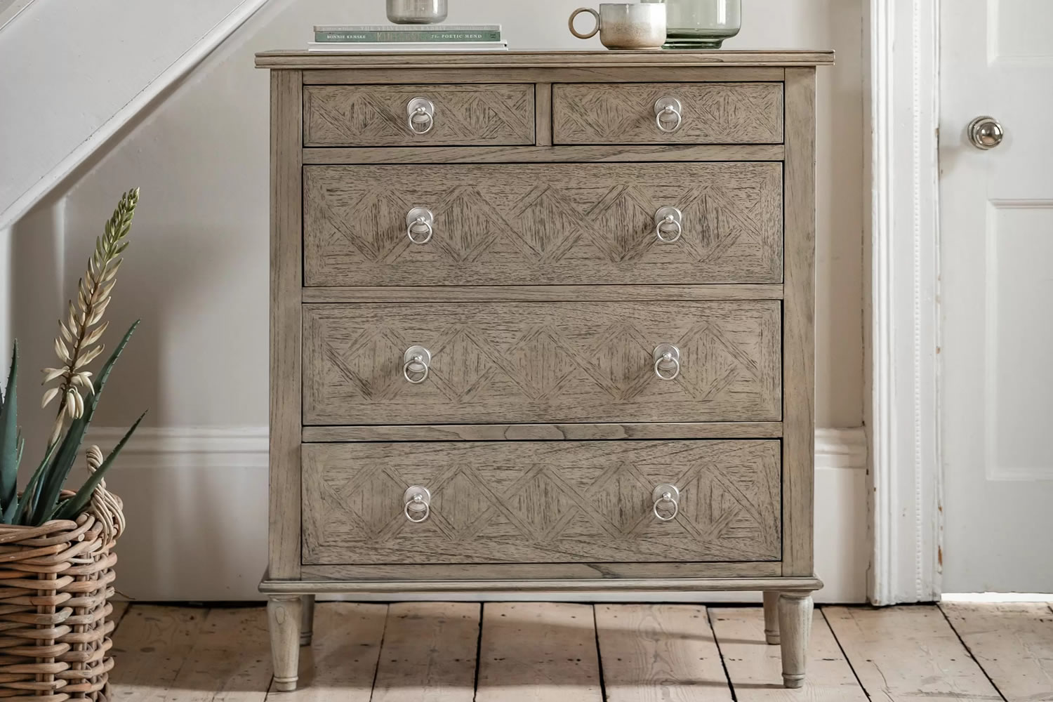 View Mustique Wooden 5 Drawer Storage Chest Made From Mindi Ash MDF 2 Small 3 Large Storage Drawers Metal Pull Handles Spindle Turned Legs information