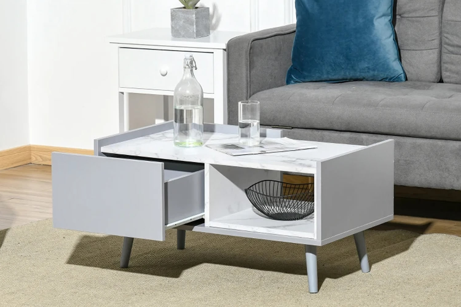 View Pomona Wooden Coffee Table TwoTone Grey White Faux Marble Finish One Storage Drawer One Open Shelf Pine Wood Legs Edge Protection Design information