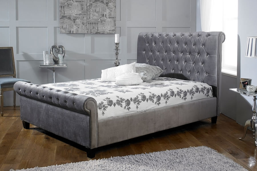 View 50 King Size Silver Velvet Fabric Sleigh Bed Frame Tall Buttoned Detailed Headboard Medium Height Footboard Strong Slatted Base Orbit information