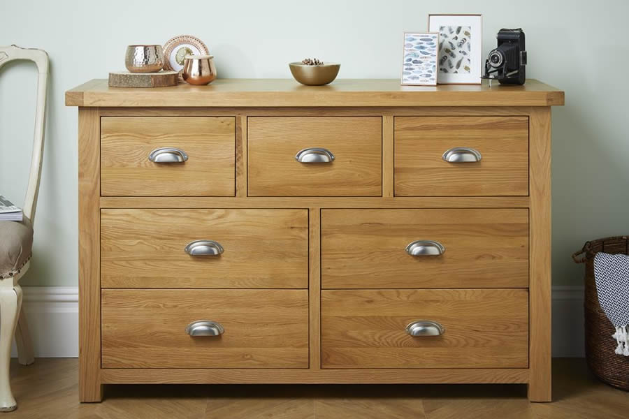 View Natural Solid Light Oak Rustic 7 Drawer Storage Chest Of Drawers 3 Small Drawers 4 Large Drawers Chrome Cup Handles Birlea Woburn information